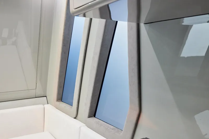 Slide: The Image of Interior view of 2025 Midnight Express 52' Vitesse yacht with sleek windows and modern design. - 28