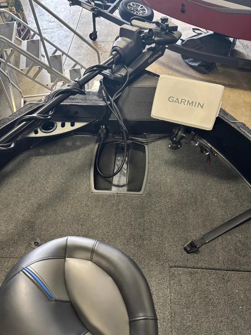 Slide: The Image of 2025 Nitro ZV21 Pro boat with Garmin navigation system, interior view. - 11