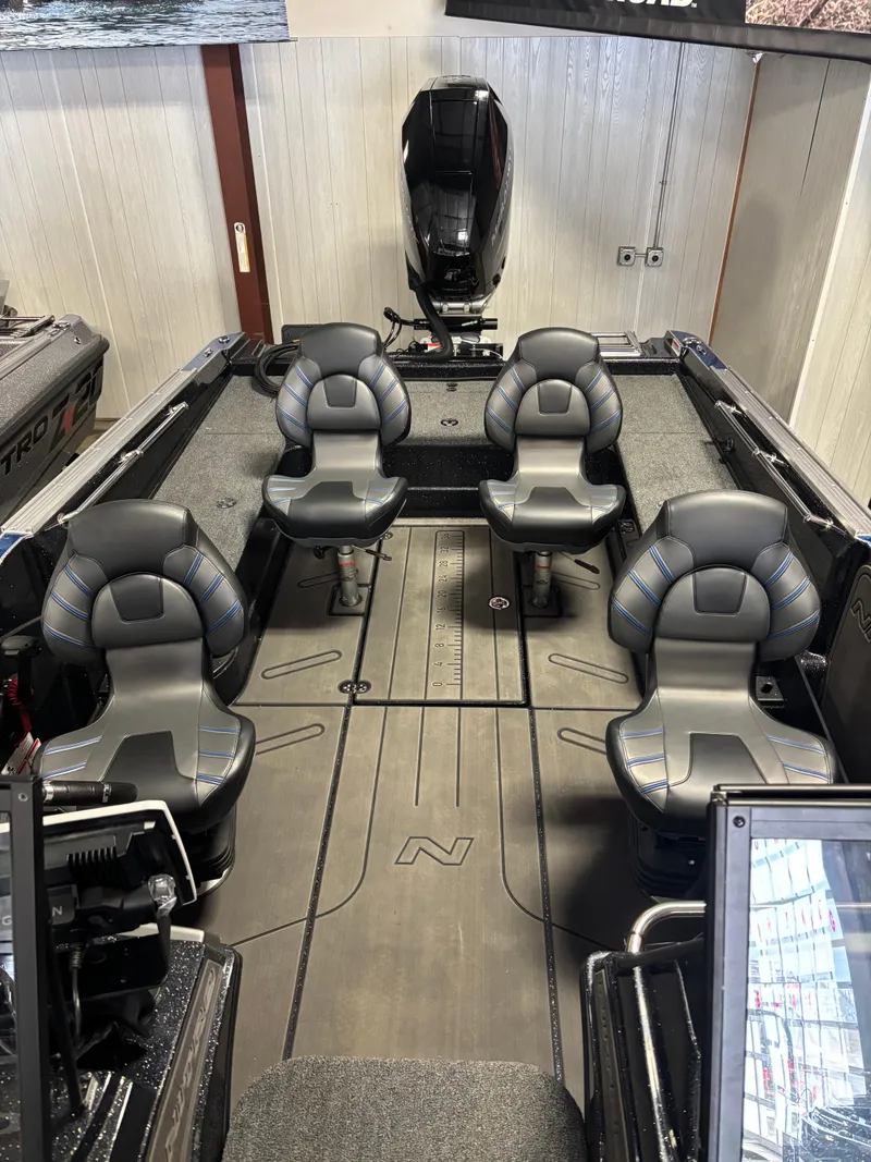 Slide: The Image of 2025 Nitro ZV21 Pro boat interior with five cushioned seats and sleek design. - 4