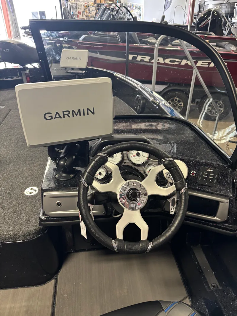 Slide: The Image of 2025 Nitro ZV21 Pro boat dashboard with Garmin navigation system. - 5