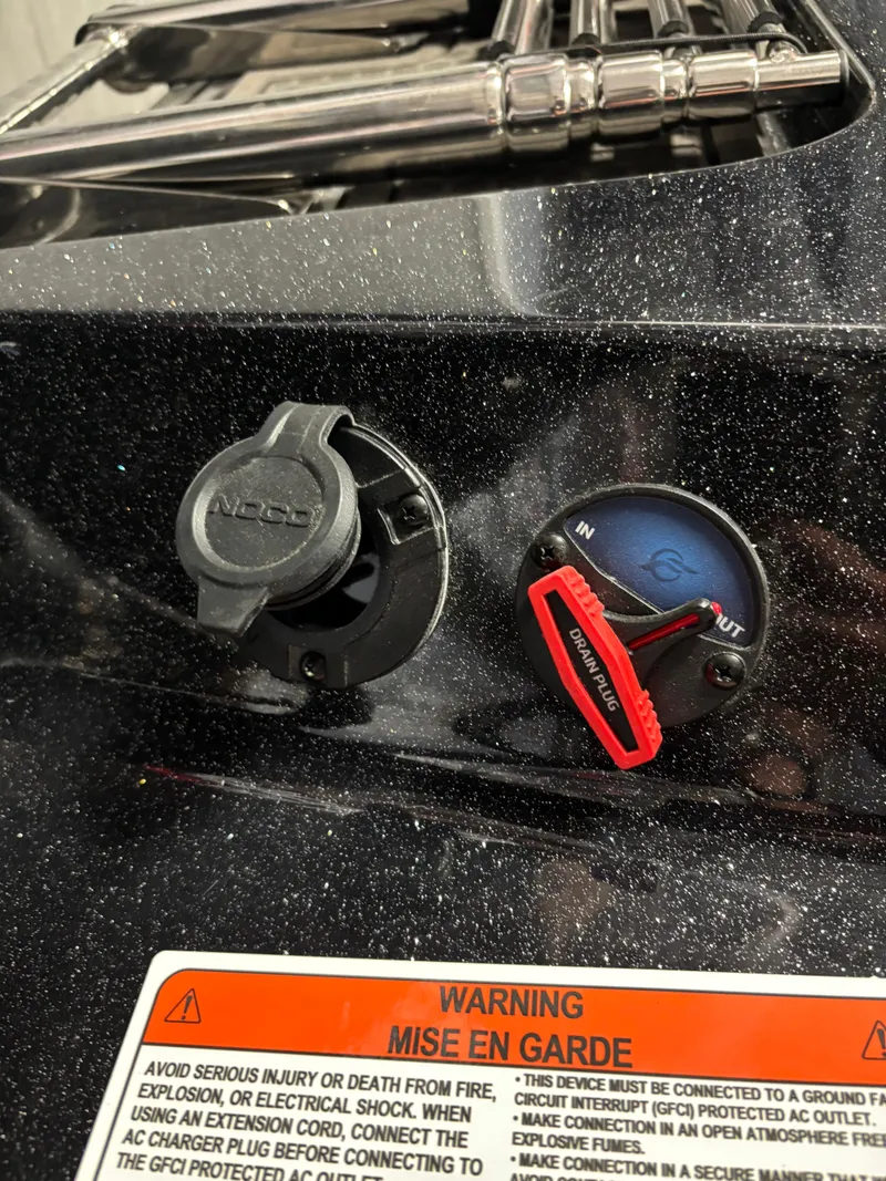 Slide: The Image of Control panel of 2025 Nitro ZV21 Pro with warning label and switches. - 7