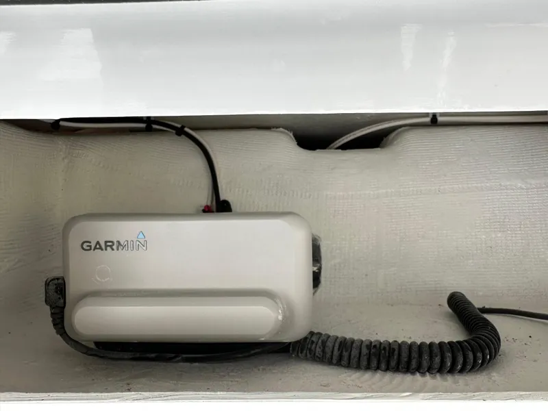 Slide: The Image of Garmin device installed in Pair Customs 27, 2025 model, with coiled cable. - 20