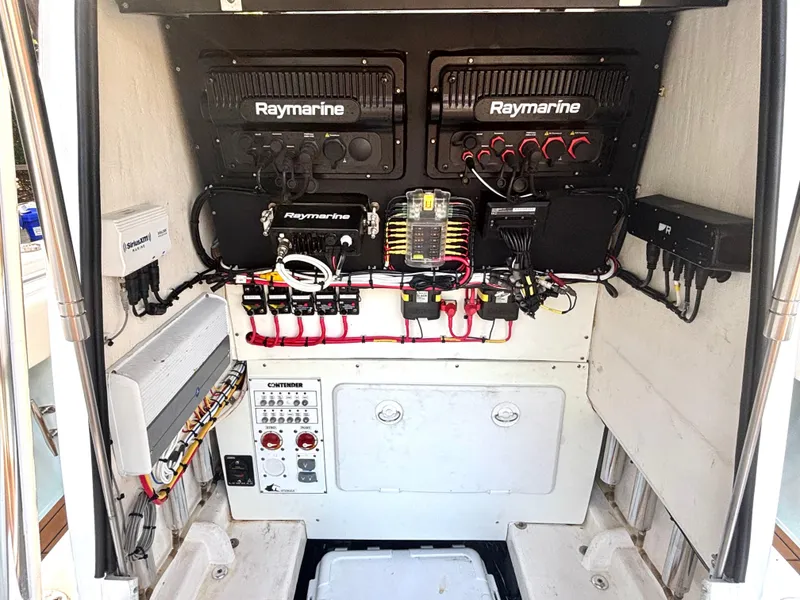 Slide: The Image of Electrical panel of a 2015 Contender 30 ST boat with Raymarine equipment. - 10