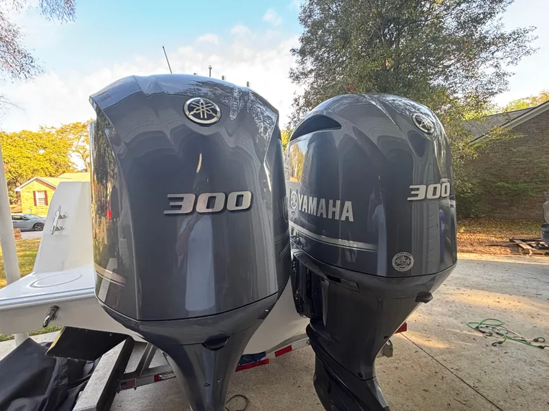 Slide: The Image of Twin Yamaha 300 outboard motors on a 2015 Contender 30 ST boat. - 11