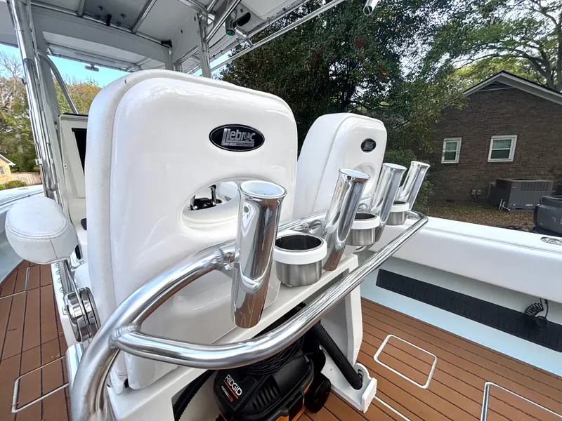 Slide: The Image of 2015 Contender 30 ST boat interior with rod holders and seating. - 23
