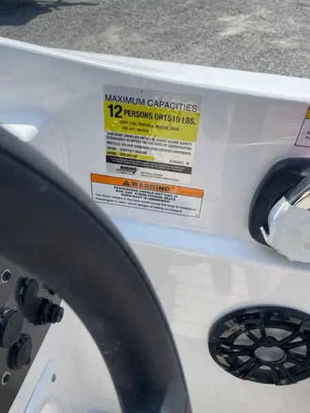 Slide: The Image of 2022 Hurricane SS 201 OB boat capacity label, maximum 12 persons or 1519 lbs. - 4