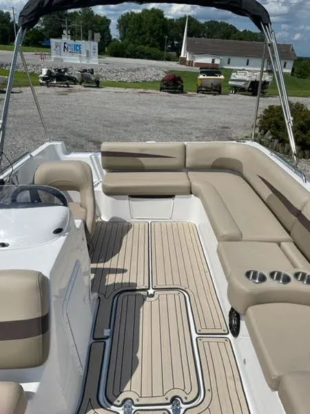 Slide: The Image of 2022 Hurricane SS 201 OB boat with beige seating and spacious deck. - 5