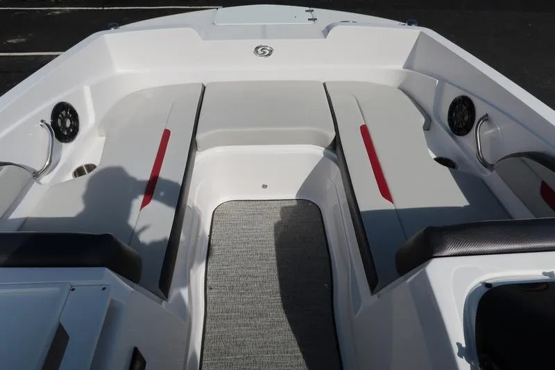 Slide: The Image of 2023 Hurricane SunDeck Sport 205 IO boat interior with seating and speakers. - 22