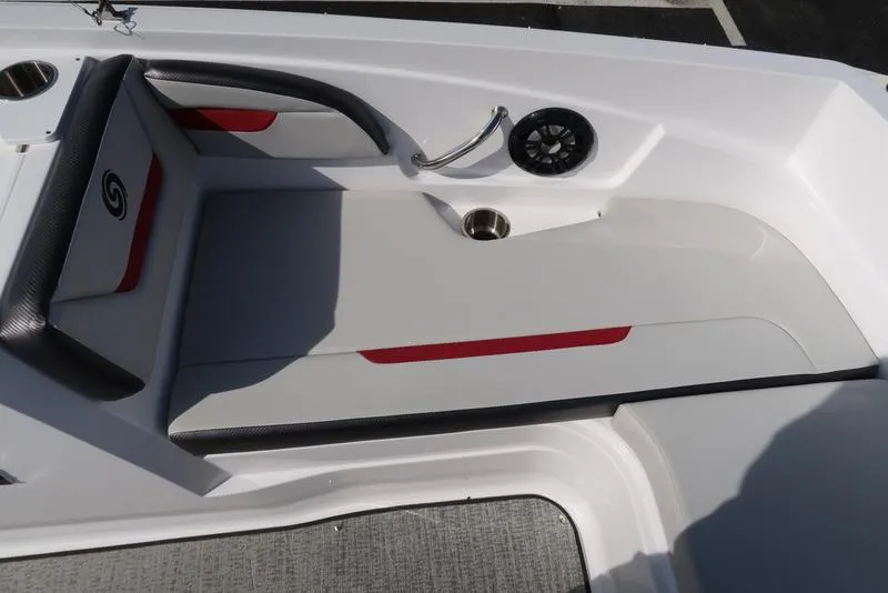 Slide: The Image of 2023 Hurricane SunDeck Sport 205 IO boat interior with seating and speaker. - 24