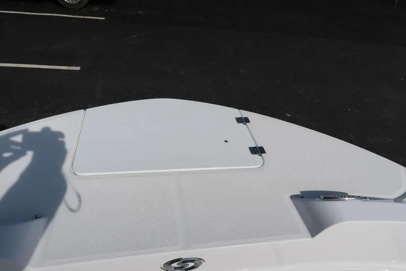 Slide: The Image of 2023 Hurricane SunDeck Sport 205 IO boat deck with storage hatch. - 29