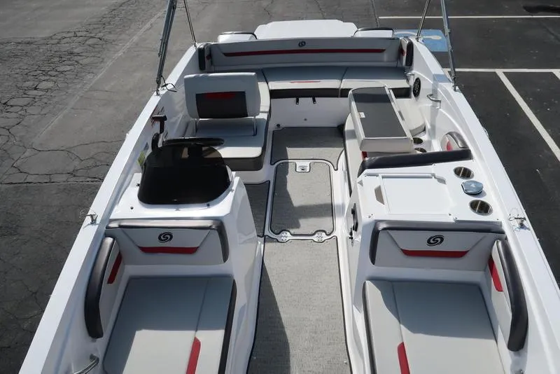 Slide: The Image of 2023 Hurricane SunDeck Sport 205 IO boat interior with seating and storage compartments. - 3