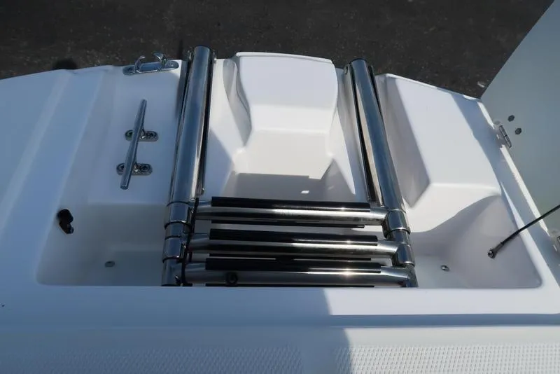 Slide: The Image of 2023 Hurricane SunDeck Sport 205 IO boat ladder and deck detail. - 30