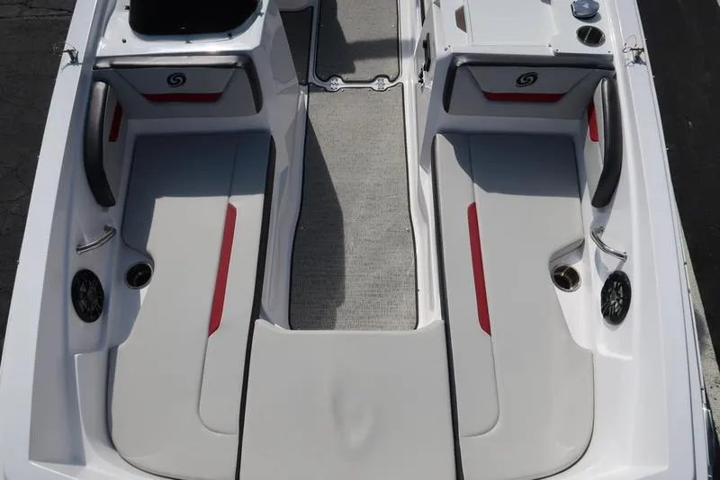 Slide: The Image of 2023 Hurricane SunDeck Sport 205 IO boat interior with seating and storage compartments. - 31