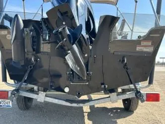 Slide: The Image of Rear view of a 2014 Lowe FM 160 T boat on a trailer. - 6