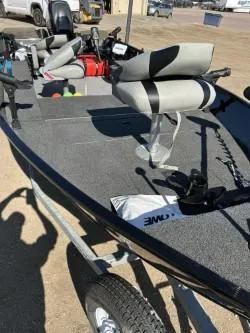 Slide: The Image of 2014 Lowe FM 160 T fishing boat with seating and equipment on a trailer. - 7