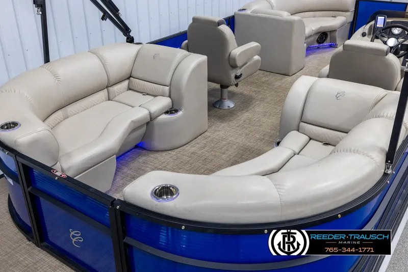 Slide: The Image of 2018 Cypress Cay 233 Seabreeze pontoon boat with plush seating and modern interior design. - 11