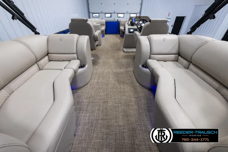 Slide: The Image of 2018 Cypress Cay 233 Seabreeze pontoon boat interior with plush seating and modern design. - 15