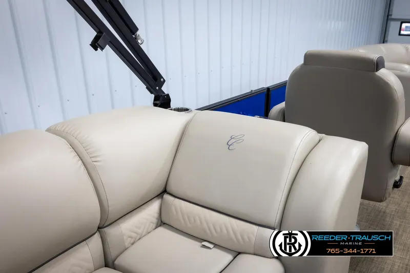 Slide: The Image of 2018 Cypress Cay 233 Seabreeze boat interior with beige leather seating. - 18