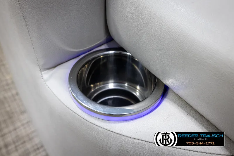 Slide: The Image of Cup holder with blue LED light on 2018 Cypress Cay 233 Seabreeze boat. - 33