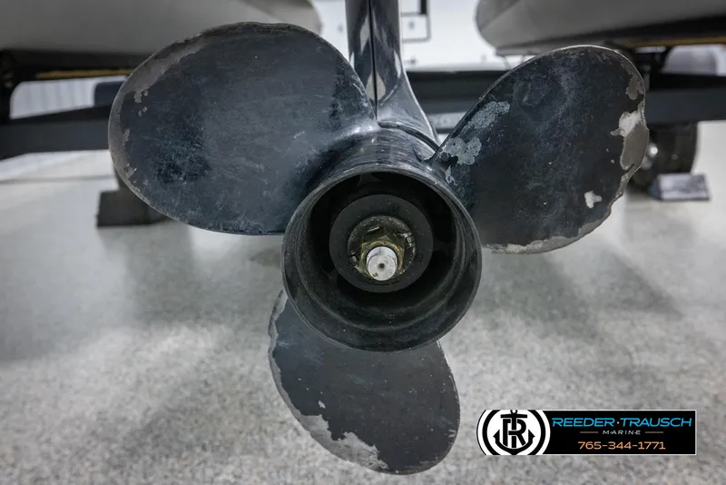 Slide: The Image of Propeller of 2018 Cypress Cay 233 Seabreeze boat, close-up view in a showroom. - 38