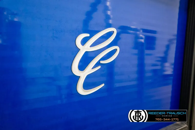 Slide: The Image of Cypress Cay 233 Seabreeze 2018 logo on blue background, Reeder-Trausch Marine branding. - 41