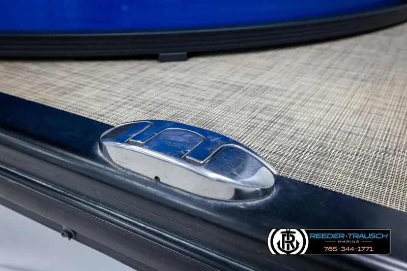 Slide: The Image of 2018 Cypress Cay 233 Seabreeze boat detail with metallic cleat and textured surface. - 43