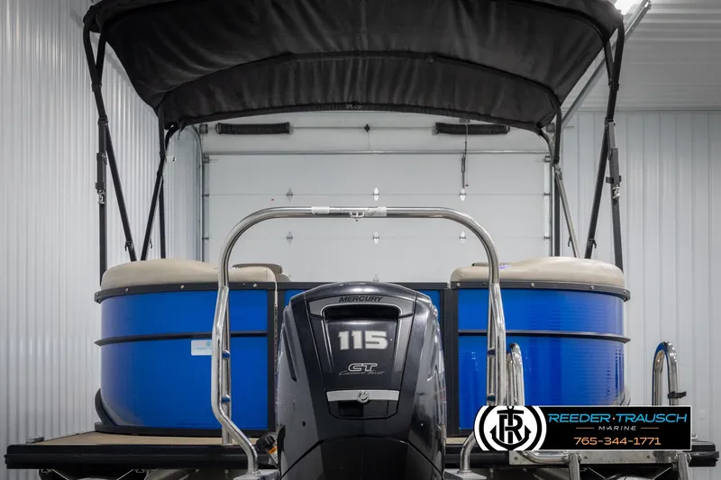 Slide: The Image of 2018 Cypress Cay 233 Seabreeze pontoon boat with Mercury 115 engine in storage. - 6