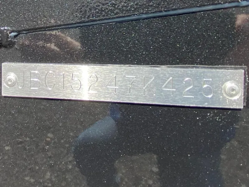 Slide: The Image of Metallic identification plate on Express H20C, 2025 model. - 7