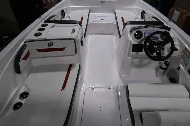 Slide: The Image of 2023 Hurricane SunDeck Sport 205 OB interior with seating and steering console. - 14