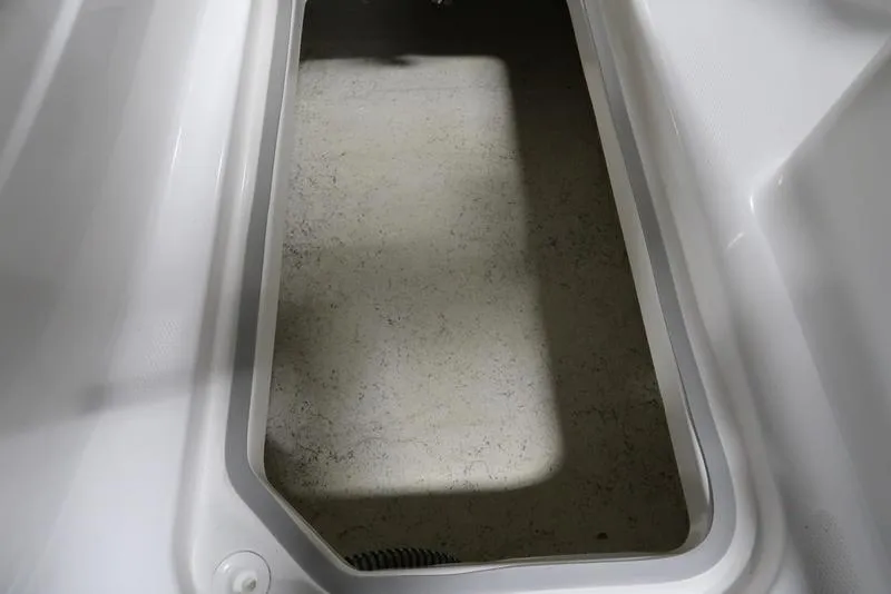 Slide: The Image of Storage compartment of 2023 Hurricane SunDeck Sport 205 OB boat. - 17