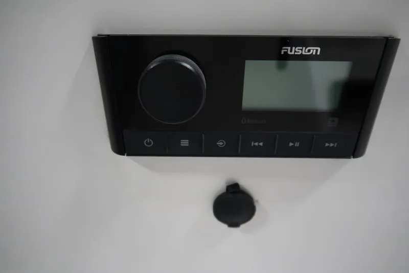 Slide: The Image of Fusion audio system on 2023 Hurricane SunDeck Sport 205 OB boat dashboard. - 19