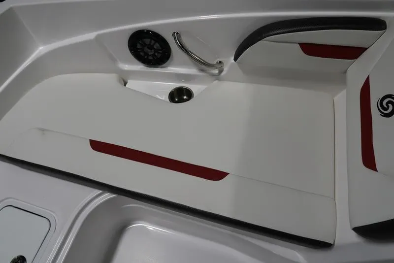 Slide: The Image of 2023 Hurricane SunDeck Sport 205 OB interior with seating and speaker detail. - 23