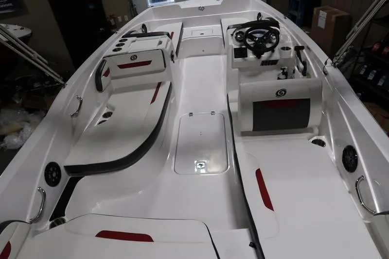 Slide: The Image of 2023 Hurricane SunDeck Sport 205 OB interior with seating and steering console. - 8