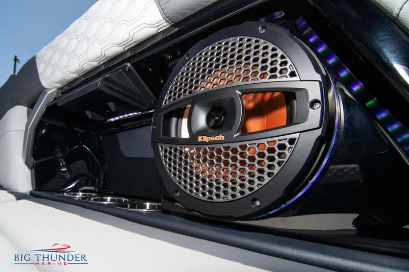 Slide: The Image of 2024 MasterCraft XT24 boat with Klipsch speaker and stylish interior design. - 26