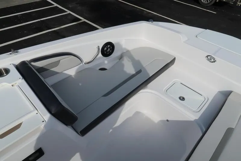 Slide: The Image of 2023 Hurricane SunDeck Sport 205 OB boat interior with seating and storage compartments. - 22