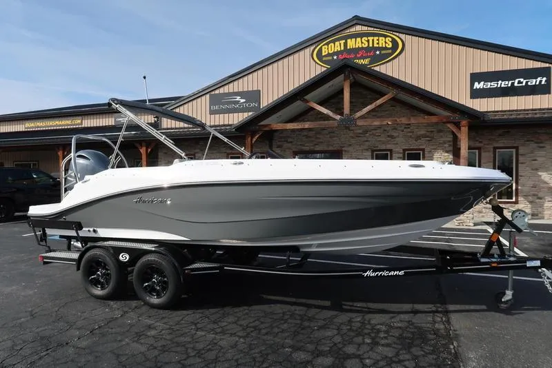 Slide: The Image of 2023 Hurricane SunDeck Sport 205 OB boat on trailer outside dealership. - 3