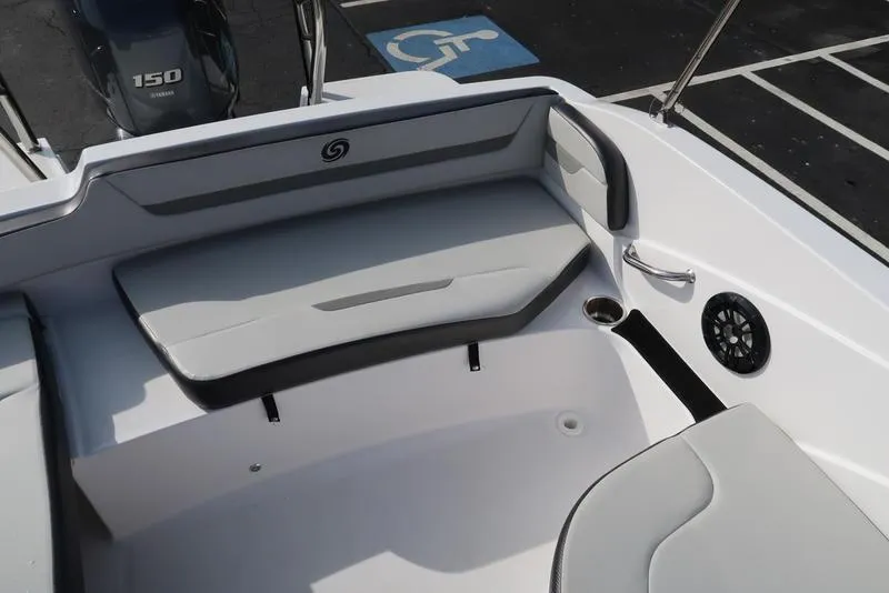 Slide: The Image of 2023 Hurricane SunDeck Sport 205 OB boat interior with seating and speaker. - 30