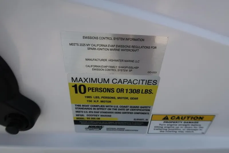 Slide: The Image of 2023 Hurricane SunDeck Sport 205 OB capacity label: 10 persons or 1308 lbs, 150 HP motor. - 38