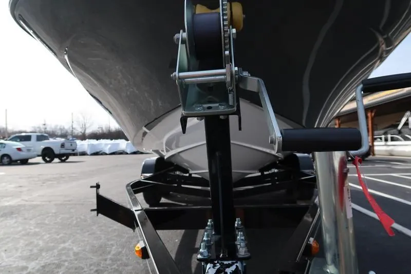 Slide: The Image of 2023 Hurricane SunDeck Sport 205 OB boat on trailer, close-up view. - 8