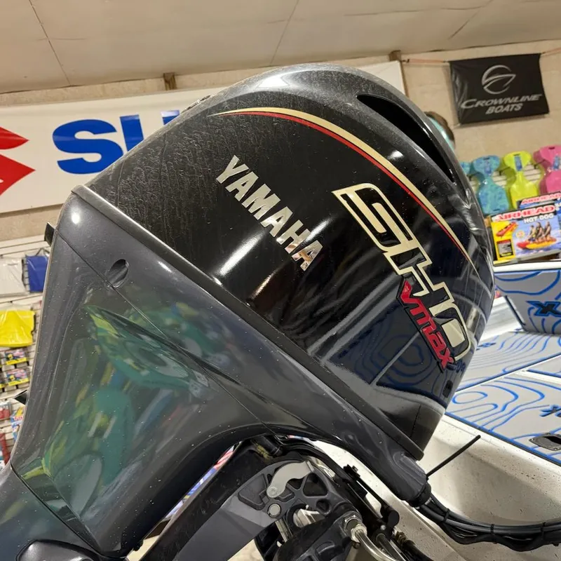 Slide: The Image of Yamaha SHO VMAX outboard motor on 2025 Express H20 Bay boat in showroom. - 10