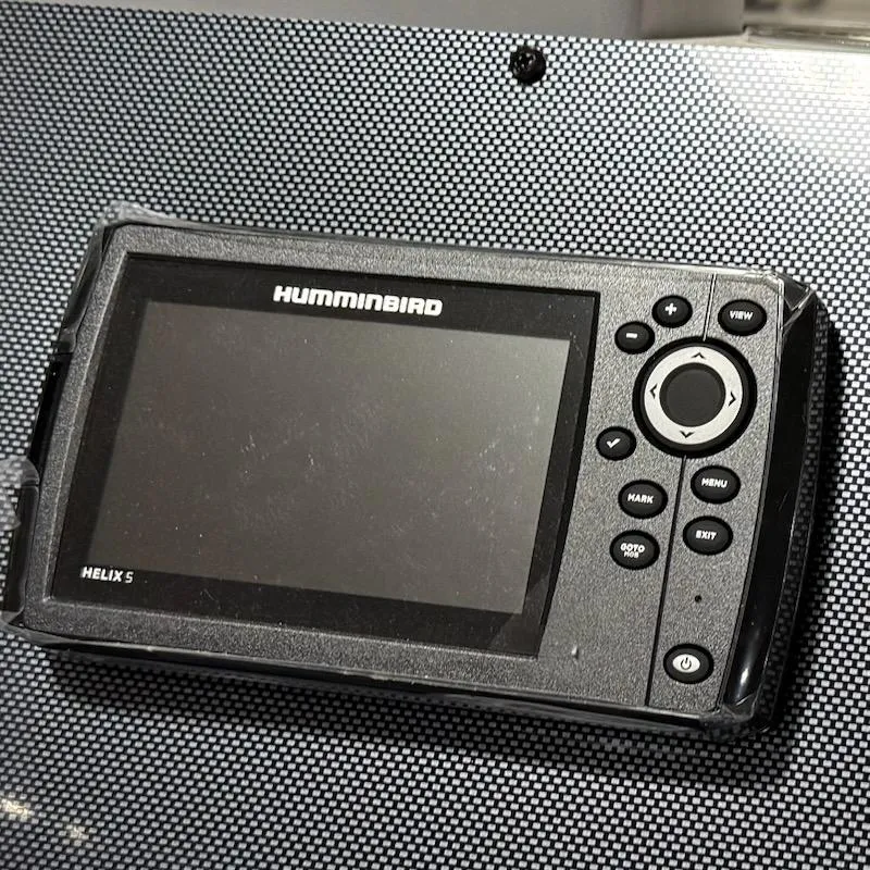 Slide: The Image of Humminbird Helix 5 fish finder on Express H20 Bay 2025 boat dashboard. - 11
