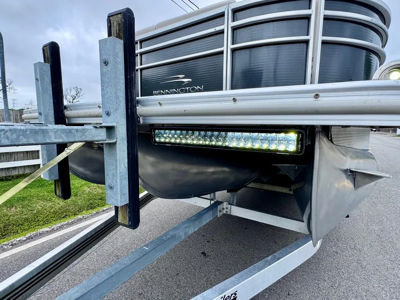 Slide: The Image of 2014 Bennington 2575 RCW pontoon boat on trailer with LED light bar. - 17