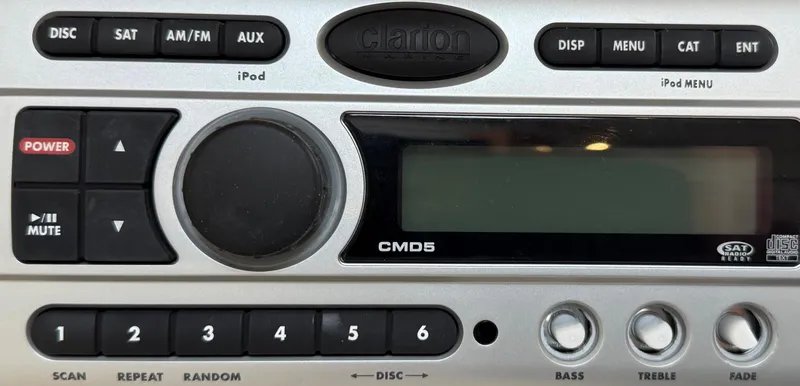 Slide: The Image of 2008 Larson 310 CABRIO stereo system with Clarion CMD5 controls and display. - 19