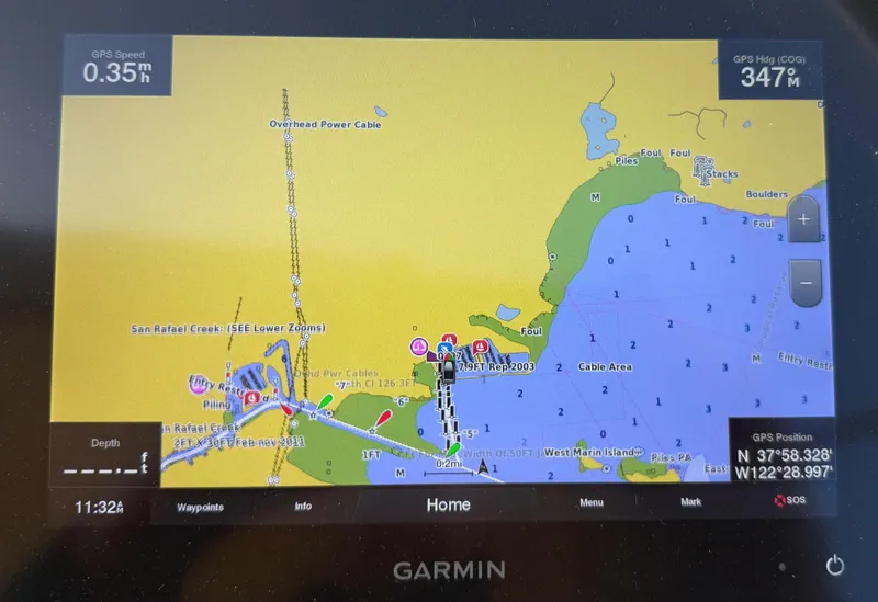 Slide: The Image of Garmin GPS display showing nautical map on a 2008 Larson 310 Cabrio boat. - 21