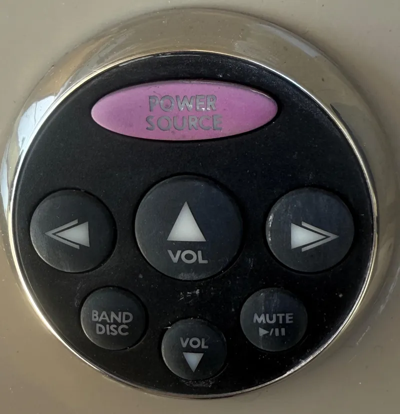 Slide: The Image of Control panel of a 2008 Larson 310 Cabrio boat audio system. - 25