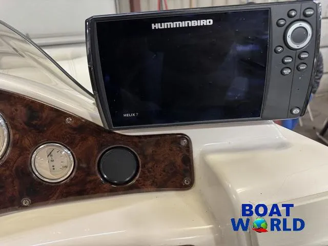 Slide: The Image of Humminbird Helix 7 fish finder on 2002 Godfrey 220 DF Pontoon dashboard. - 21