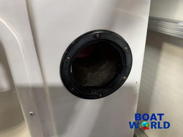 Slide: The Image of Close-up of a 2002 Godfrey 220 DF Pontoon boat component with Boat World logo. - 23