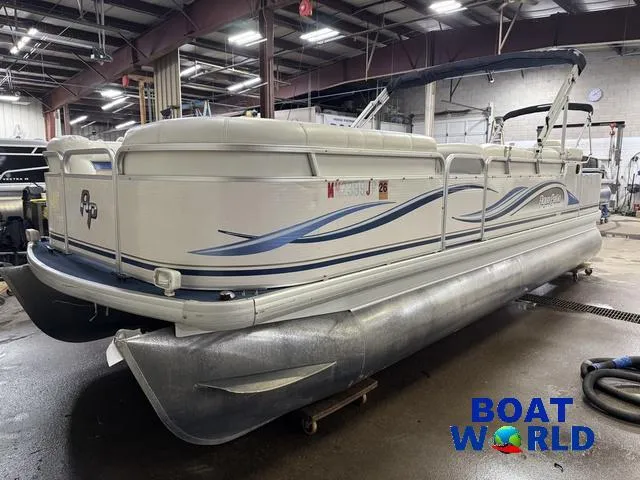 Slide: The Image of 2002 Godfrey 220 DF Pontoon boat in a warehouse setting, featuring blue wave graphics. - 47