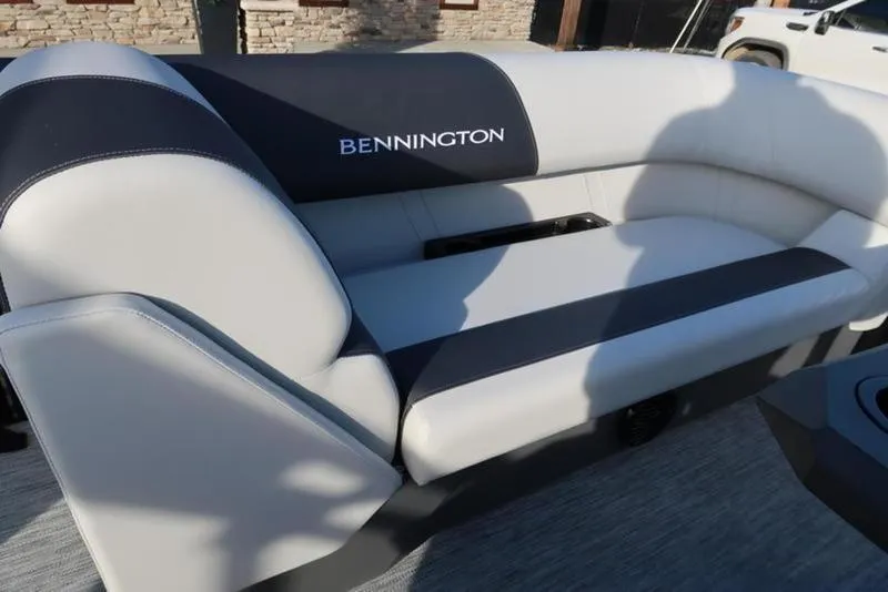 Slide: The Image of 2025 Bennington 22 SSB boat seating with gray and black upholstery. - 12