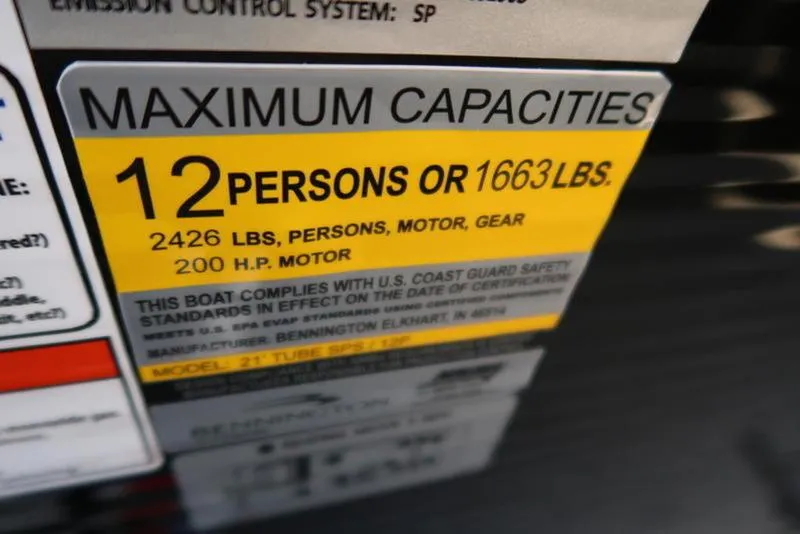 Slide: The Image of Capacity label for 2025 Bennington 22 SSB: 12 persons or 1663 lbs, 200 HP motor. - 15